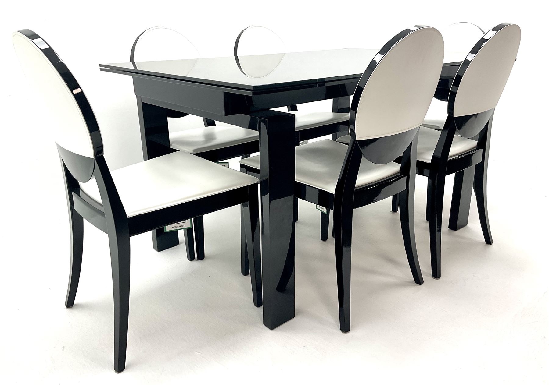 Ponsfords Sheffield Italian black gloss and glass extending dining table, rectangular supports (W220cm & 140cm, H77cm, D90cm) and set six chairs black and white dining chairs (W48cm)