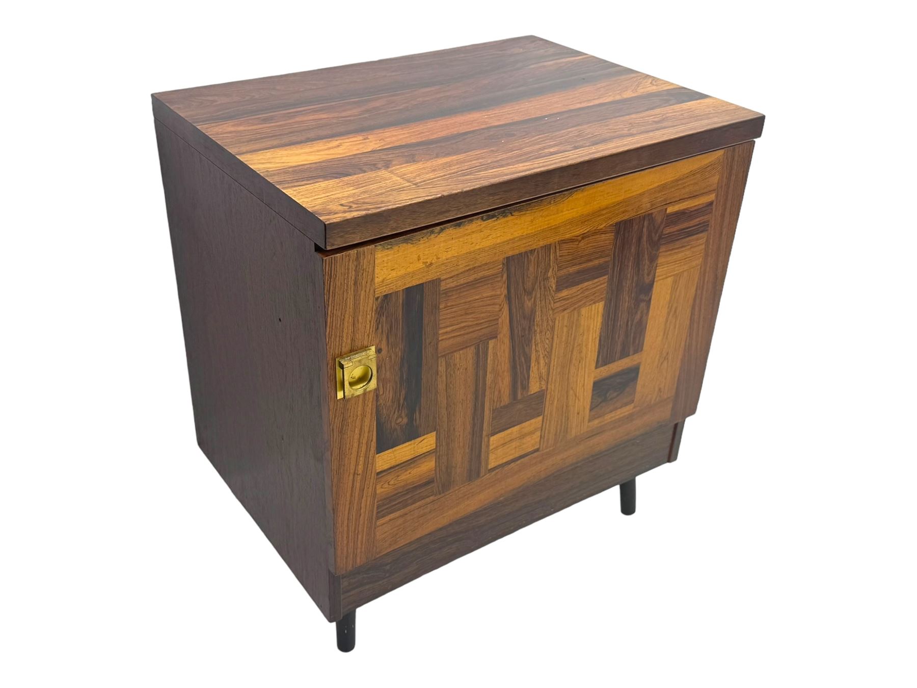 Troeds of Sweden - mid-20th century rosewood veneered cupboard, single door with brass handle enclosing interior fitted with one drawer, raised on ebonised tapered and splayed supports