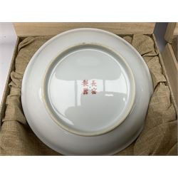 Three Chinese polychrome enamel plates each decorated with floral decoration, all marked beneath, D21cm 