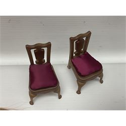 Seven Pippa dolls and a collection of plastic dolls house furniture