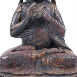 20th century bronzed Tibetan figure Tsongkhapa, seated upon a double lotus leaf, H30cm