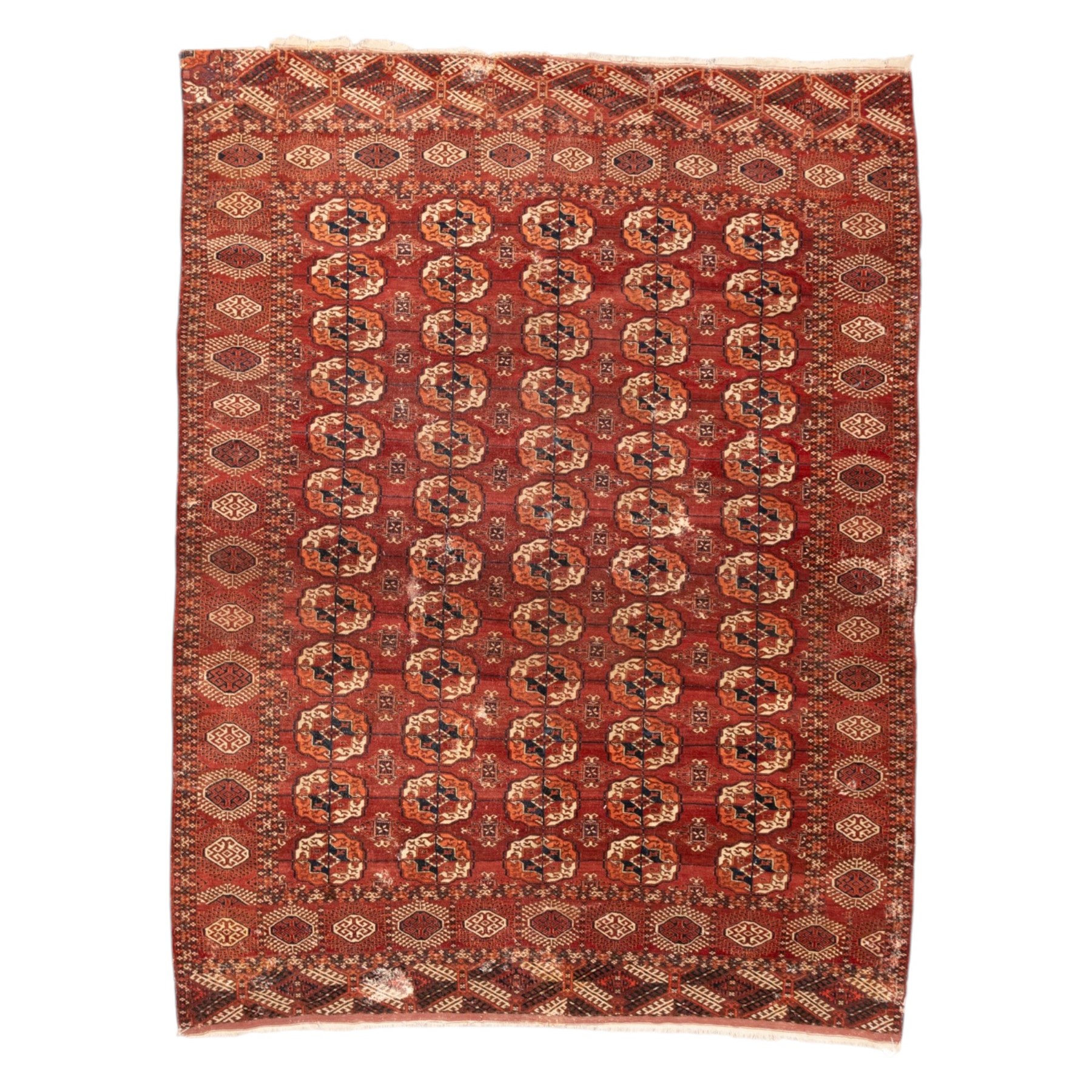 Persian Bokhara crimson ground rug, the field decorated with five rows of repeating Gul motifs with interspersed geometric design, enclosed by a guard band of further geometric-style Gul designs comprised of hook motifs