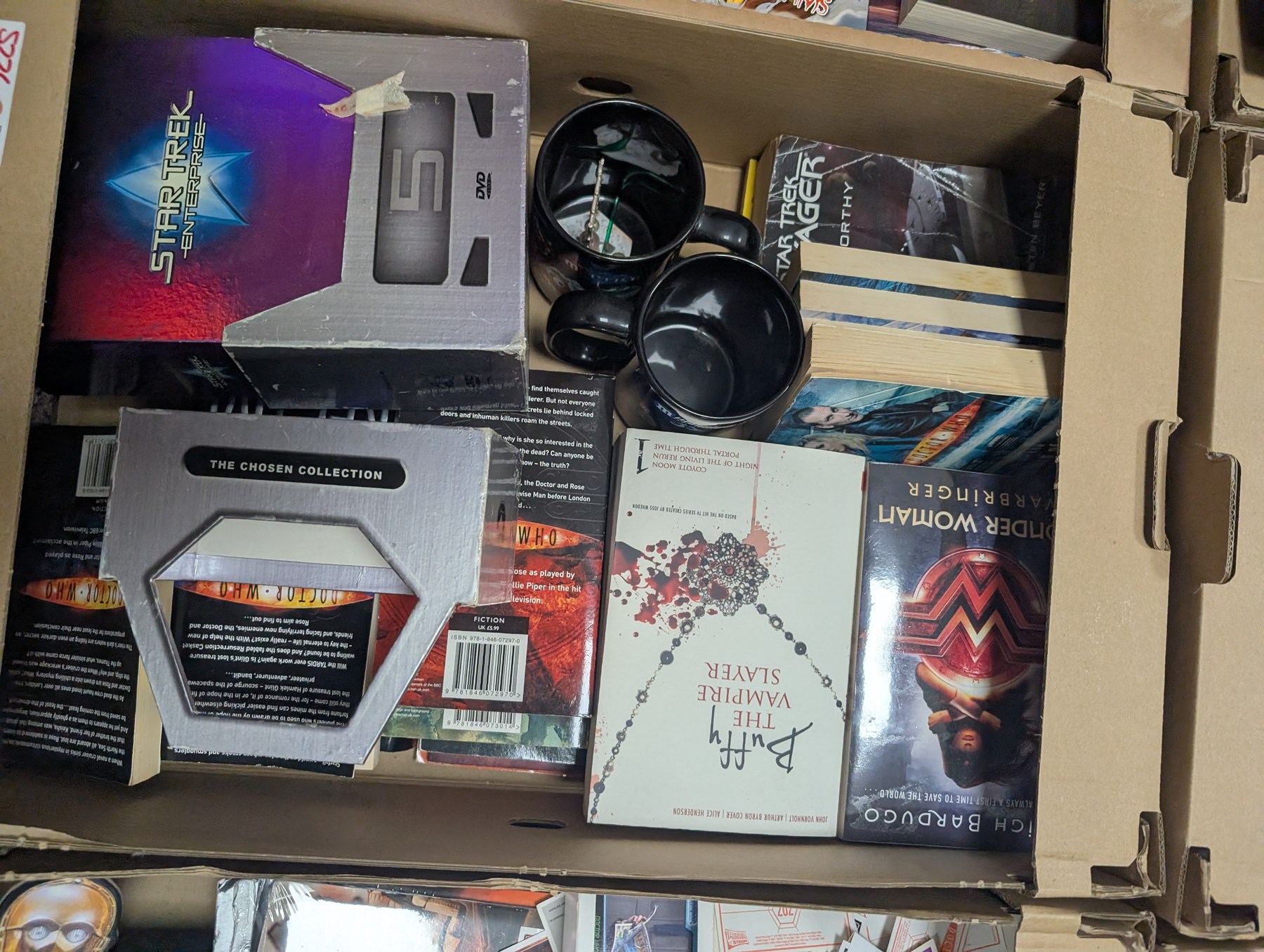 Collection of Sci-Fi related books, collectables and ephemera, including Star Wars, Buffy, Star Trek, Doctor Who and James Bond, together with other novels and non-fiction books, in six boxes