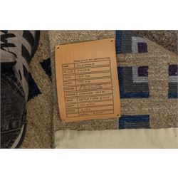 Rugs by Design - ‘Silk Stone’ Nepalese thick pile wool rug, with plain textured camel ground and geometric border detail in blue, grey and dark tones to two sides