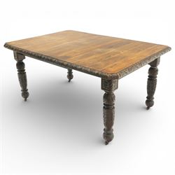 19th century heavily carved oak extending dining table, with winding mechanism and a gadro...