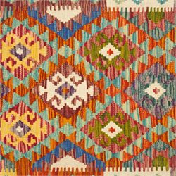 Afghan Maimana flatweave kilim runner, central field features large bold nested diamond motifs and stylized geometric lozenge patterns on olive purple, blue, and green tone ground, border stripe in mustard ground, and fringe