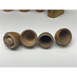 Collection of Mauchline ware relating to sewing, to include four ovoid shaped thimble cases, hinged lid thimble case and needle cases (12) 