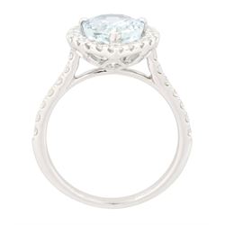 White gold aquamarine and diamond cluster ring, single pear cut aquamarine of approx 2.75 carat, surrounded by round brilliant cut diamonds and diamond set shoulders, hallmarked 9ct