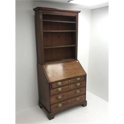 George III and later mahogany bookcase bureau, projecting cornice, three adjustable shelves, fall front enclosing fitted interior above four graduating drawers, ogee bracket supports