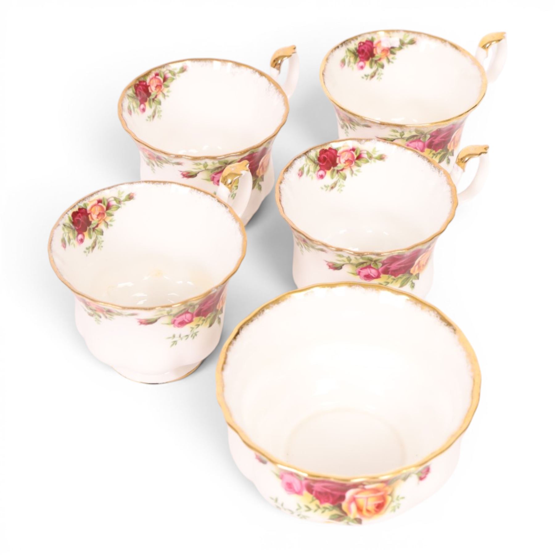 Royal Albert Old Country Roses part tea and dinner service, including teapot, milk jug, open sucrier, six tea cups and saucers, four dinner plates etc 