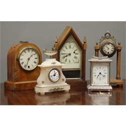  Early 20th century walnut cased dome top mantel clock, 'Ansoina' polished metal alarm clock, 20th century walnut cased portico clock, pointed arched top mantel clock with glazed door and a alabaster mantel clock  