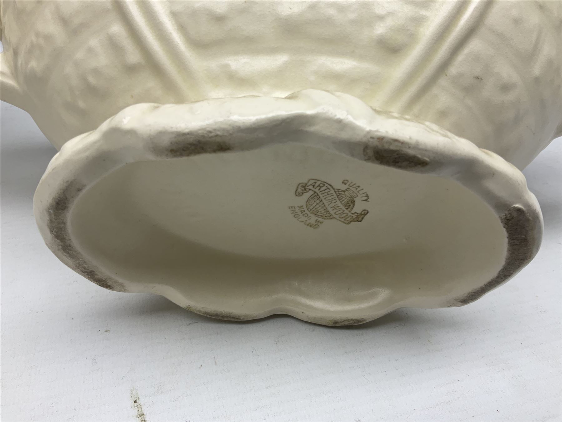 Two Arthur Wood twin handled vases to include one example in the Garden Wall pattern, together with a Beswick Ware merging green, yellow and cream vase, all with marks beneath, tallest H23cm