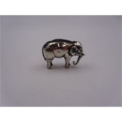 Edwardian silver mounted novelty pin cushion, in the form of an elephant, with cushioned back, hallmarked Birmingham 1906, maker's mark worn and indistinct, L4cm, H3.5cm