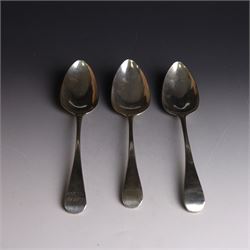 Three George III silver Old English pattern table spoons, one with engraved monogram to terminal, hallmarked Solomon Hougham, London 1802, a further example hallmarked London 1805, makers mark indistinct and one other hallmarked George Wintle, London 1807