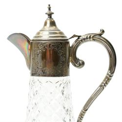 Pair of cut glass claret jugs with engraved silver mounts H32cm Birmingham 1971 Maker Charles s Green & Co Ltd