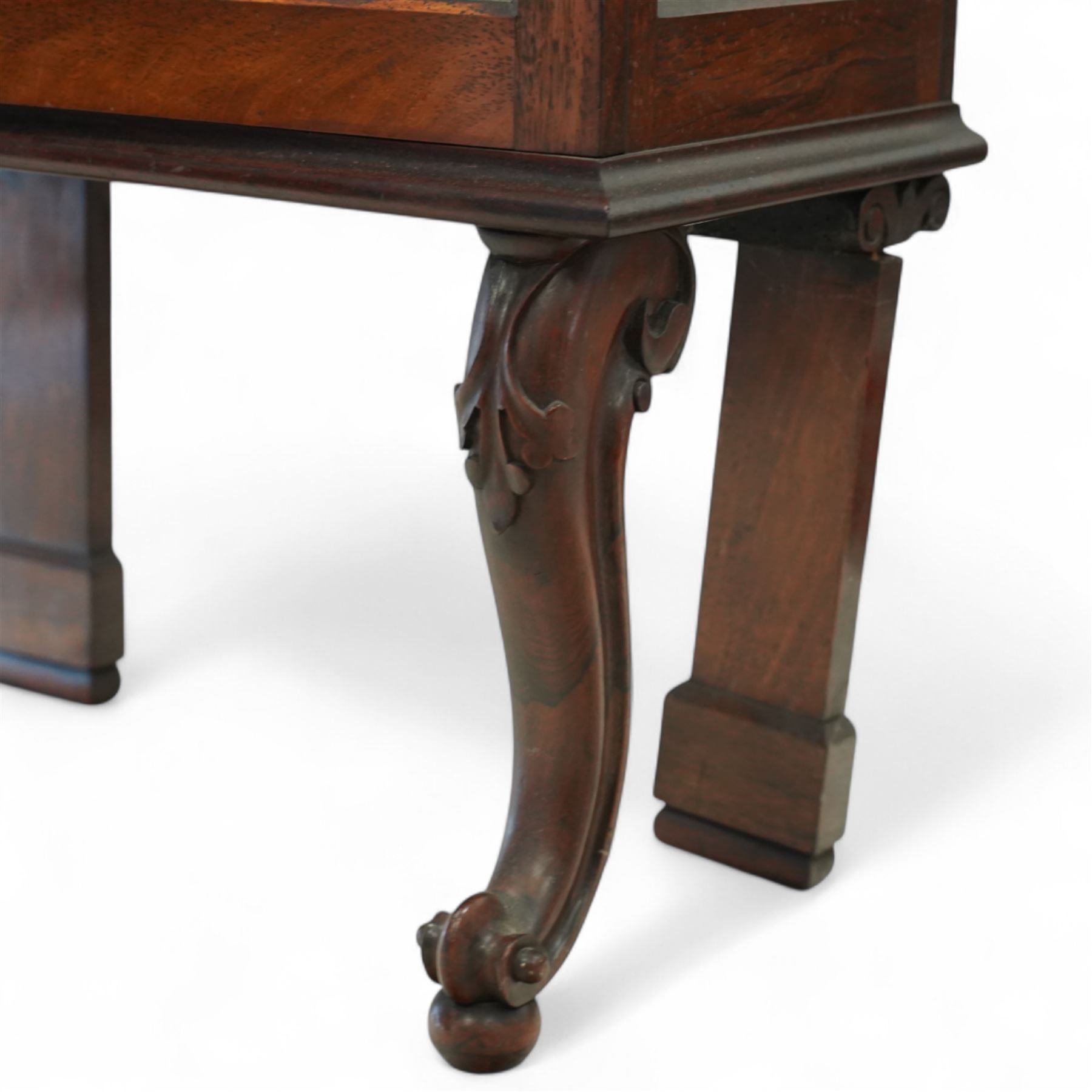 Early 20th-century mahogany wall display cabinet, of tall and narrow rectangular form, moulded cornice above hinged glazed door with four internal shelves, the legs with acanthus carved knee on scroll carved cabriole front legs and stile back legs 