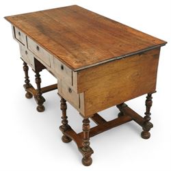 19th-century Louis XIV design French walnut bureau Mazarin, rectangular top above central drawer and recessed drawer flanked by two rows of small drawers,  supported on baluster turned legs united by an H-form stretcher, raised on bun feet 