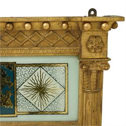 Regency period giltwood and verre-eglomise mirror, gilded frieze with trellis and ball design flanked by paterae and gilded beading beneath, above a large reverse painted glass panel depicting a monastic building between stylized diamond design with striations, gilded and hand-painted on glass flanked by Corinthian capitals above fluted columns between the original mirror plate above a stepped and beaded moulded base, circa 1815


Provenance: No. 1 Charlotte Square, New Town, Edinburgh.