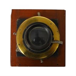 19th century single draw wooden telescope with brass mounts on a wooden stand, together with a mahogany and brass conical daylight enlarger and a B.I.T brass lens