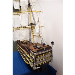  Large scale model of Nelson's Flagship HMS Victory, three masted, with sails up, painted decoration, L160cm, W28cm, H113cm   