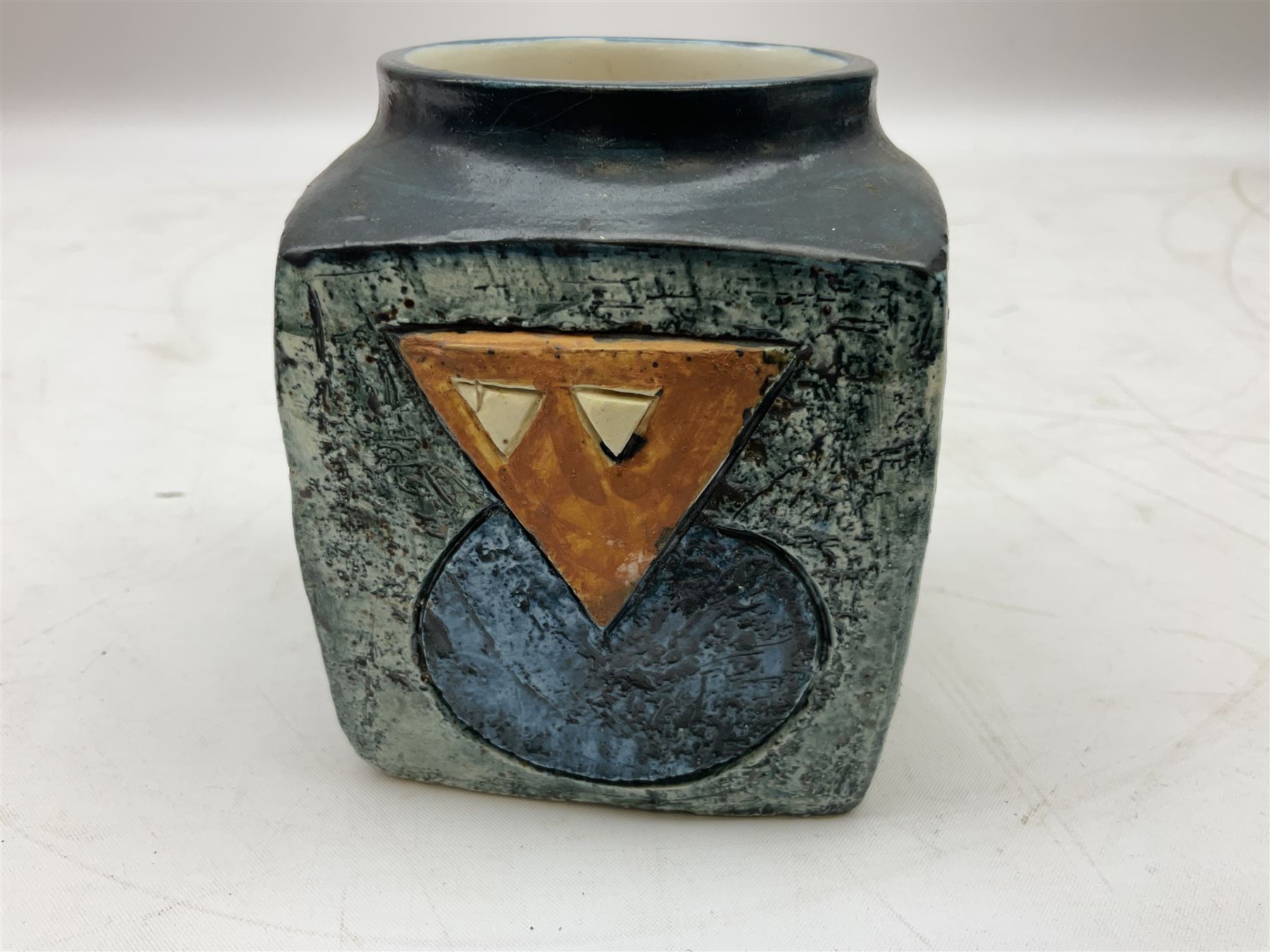 Troika cube vase, designed by Sally Bart, with a geometric design, with painted marks to base, H9.5cm.