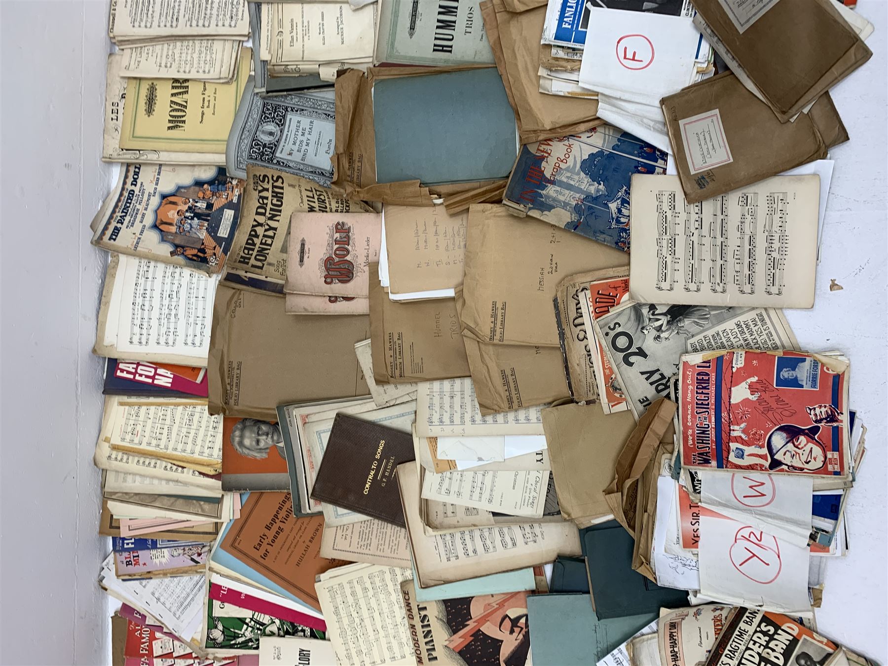 Steinway & Sons - late 19th century figured walnut upright piano, iron framed and overstrung, model no. 56174 circa. 1886, W154cm, H137cm, D70cm, together with a quantity of sheet music