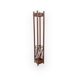 Contemporary mahogany coat and hat stand, tall rectangular form with eight hooks and decor...