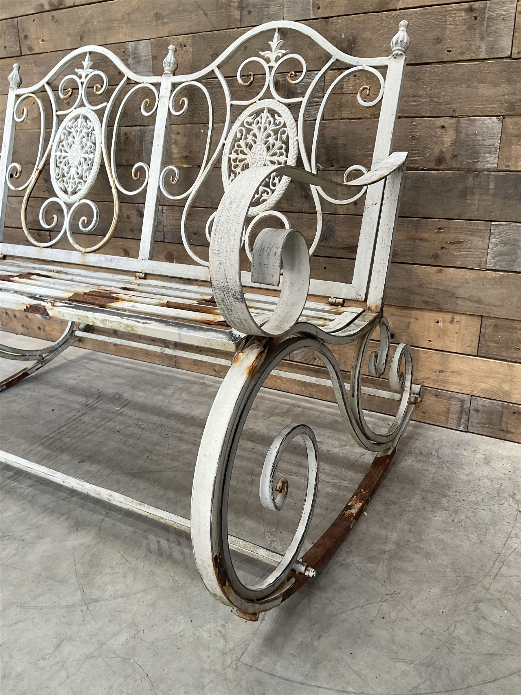 Wrought metal rocking garden bench seat, in antique grey finish
