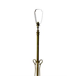 Early 20th century Art Nouveau brass standard lamp, telescopic column, late 19th century brass fire fender with scrolled supports (W137cm), and another brass standard lamp