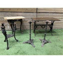 Britannia cast iron pub table, an ornate cast iron rectangular pub table, and three cast iron table bases (5) - THIS LOT IS TO BE COLLECTED BY APPOINTMENT FROM DUGGLEBY STORAGE, GREAT HILL, EASTFIELD, SCARBOROUGH, YO11 3TX