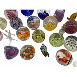 Glass paperweights to include Caithness, Firefly glass, Mdina and others, mostly unmarked, together with Murano glass animals, scent bottle etc in two boxes