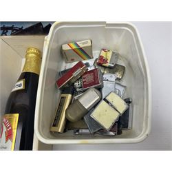 John Smiths presentation box commemorating 100 years of the Tadcaster brewery, containing two bottles of special brew and a glass, and a collection of lighters including Ronson and Jutson