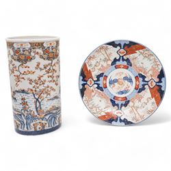 Late 19th/early 20th century Japanese imari charger, decorated with panels of mountains and bamboo, D46cm, and a large imari pattern stick stand, H48cm (2)