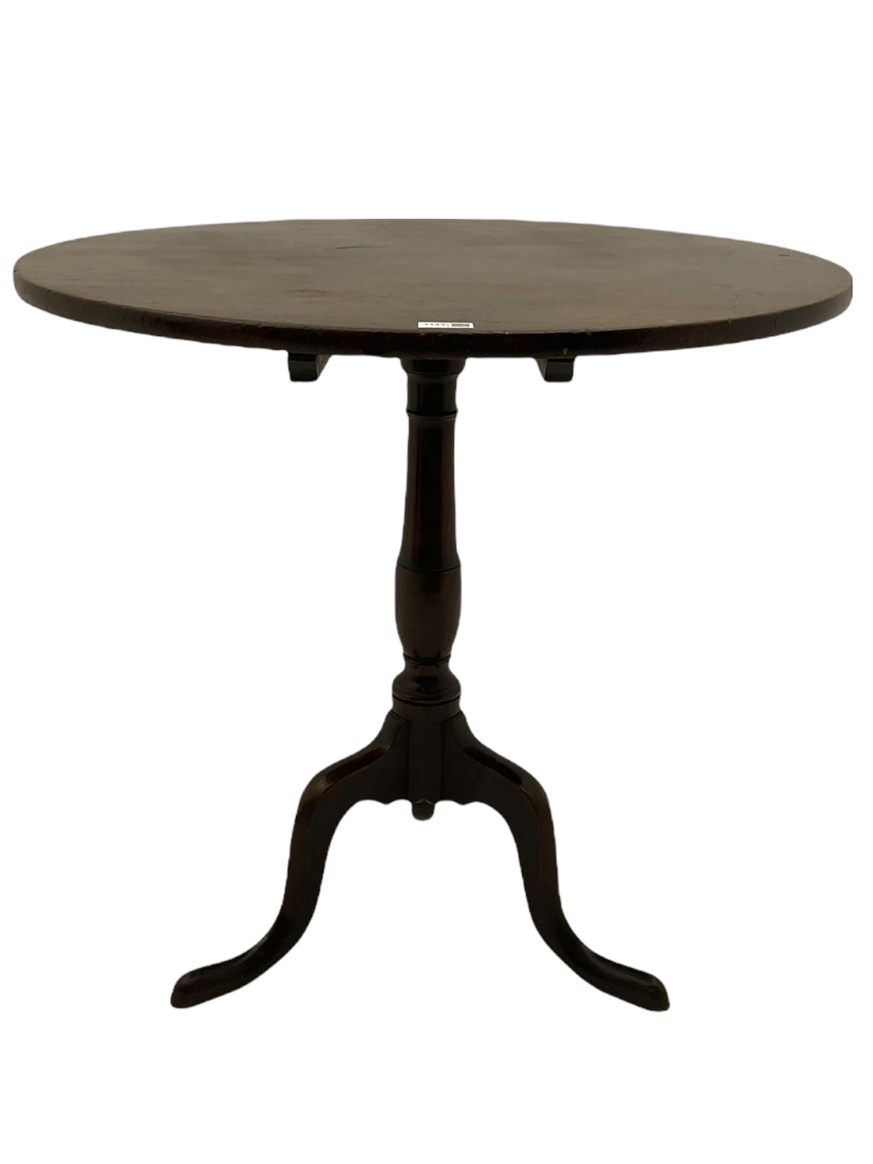 Georgian mahogany tripod table, circular tilt top on turned column, three out splayed supports