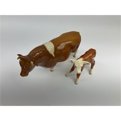 Beswick Guernsey bull Sabrina's Sir Richard 14th, model no 1415, printed mark beneath, along with figure of calf possibly Beswick model 901b, unmarked. 