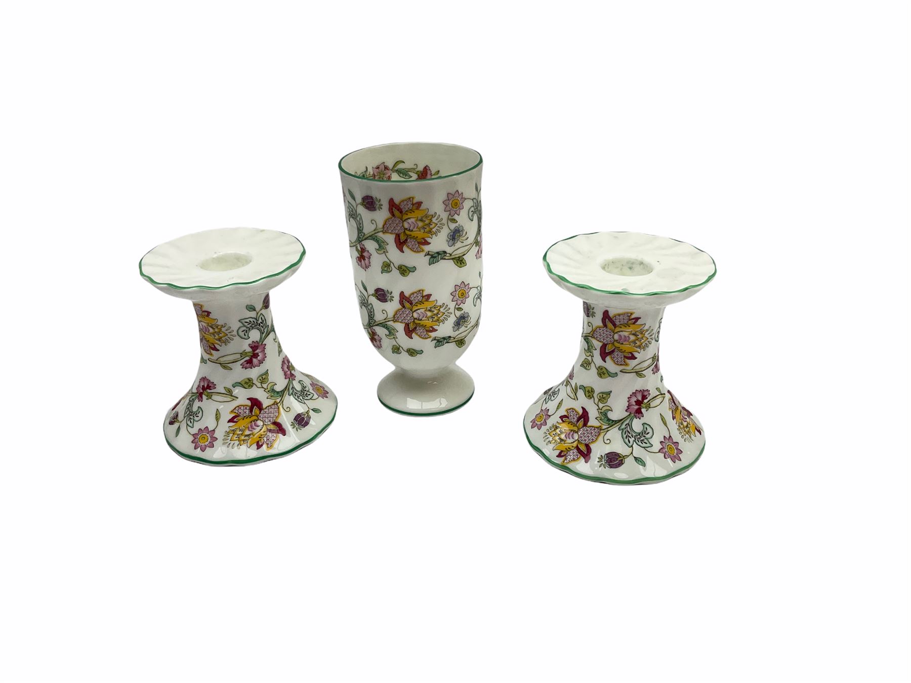 Minton Haddon Hall pattern tea and dinner wares, including basket dish, two covered tureens, six dinner plates, eight dessert plates, twelve tea plates, six soup bowls, six cereal bowls, teapot, coffee pot, milk jug, covered sucrier twelve tea cups and saucers, six mugs, footed bon bon dish, pair of candlestick holders, cake knife and slice etc (81)