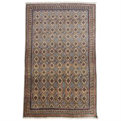North East Persian Moud hand-knotted carpet, ivory field with an-over Herati inspired latt...