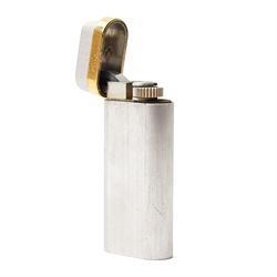 Cartier - silver-tone and gold-tone pocket lighter, with brushed vertical finish, hinged cover and gold-tone band signed Cartier, base signed Cartier and numbered, with original fitted presentation box, outer box and international guarantee booklet