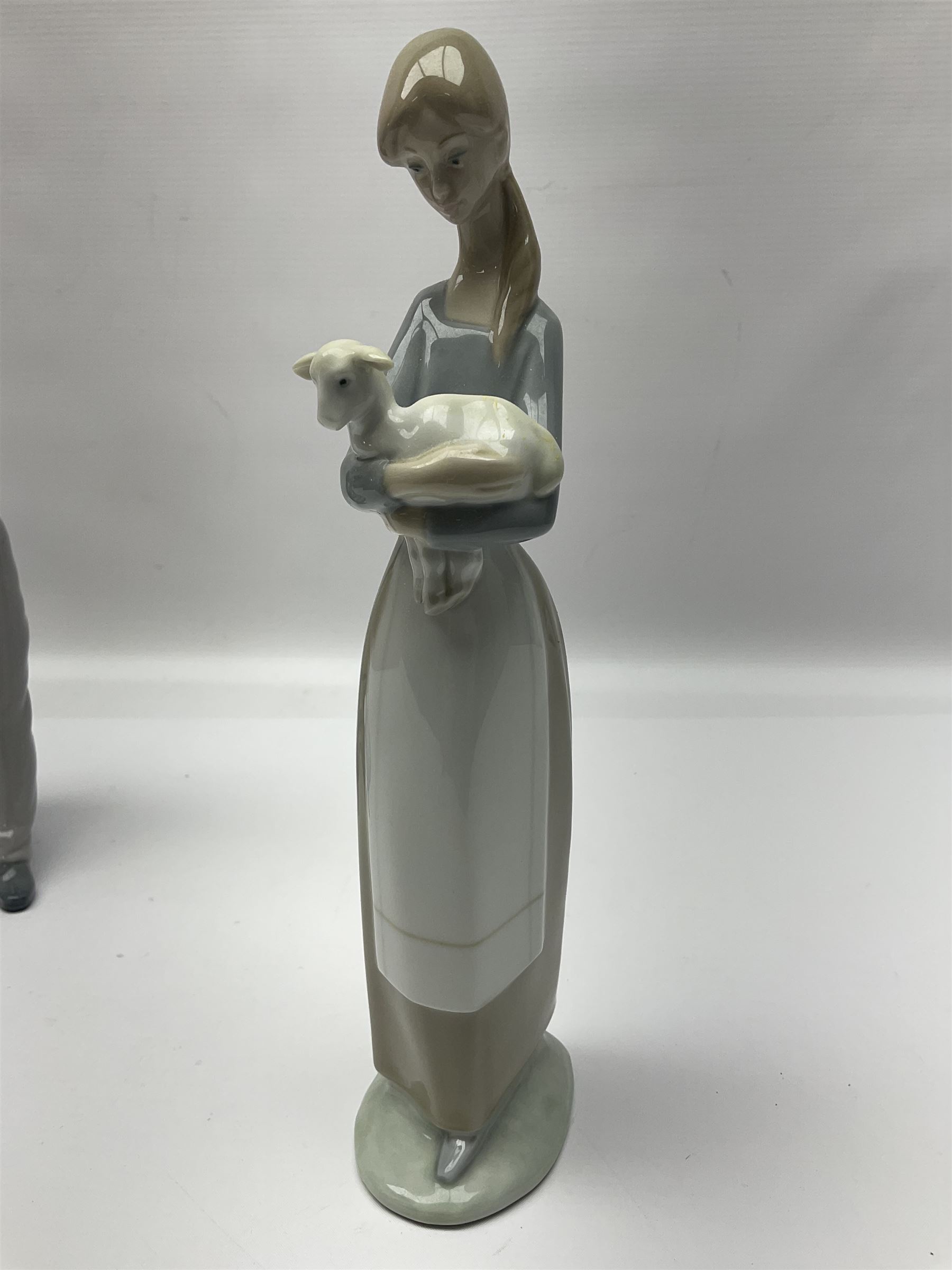 Five Lladro figures, to include How do you do 1439, Sweet Scent 5221, Shepherdess with duck 4568, etc and one Nao 