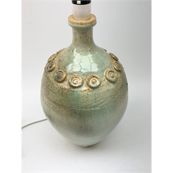 A studio pottery lamp, of baluster form with mottled green ground, lamp H40cm.