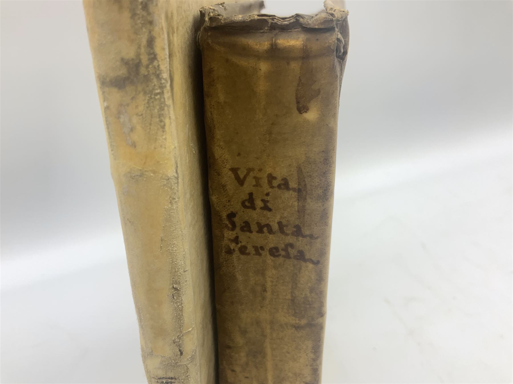 Vita Della Serafica Vergine, E Gloriosa Madre Santa Teresa Digesu .... 1747 Venezia Presso Andrea Poletti. Engraved frontispiece; and Iusti Lipsi Diva Sichemiensis fiue Aspricollis: Nouaeius Beneficia & Admiranda. 1605 Antwerpiae Ex officina Plantiniana. Engraved title page. Both with full vellum binding (2)