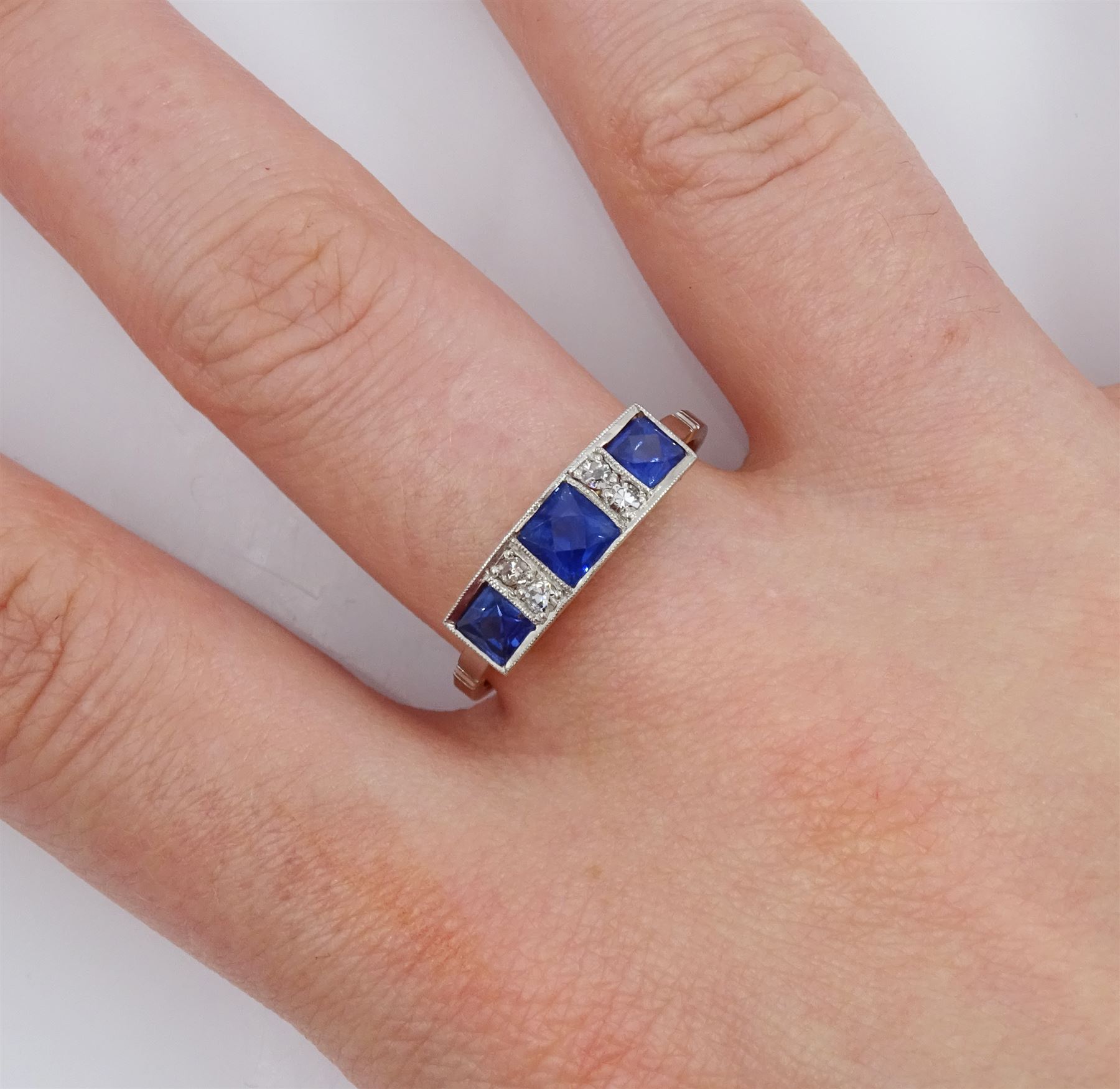 Art Deco 18ct gold milgrain set three stone French cut sapphire and four stone old cut diamond ring by R. Bros, stamped, total sapphire weight approx 1.00 carat