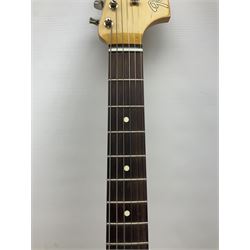 Mexican Fender Jaguar electric guitar with Humbucker pick-ups and tremolo arm, serial no.MX16741977, L101cm; in soft carrying case