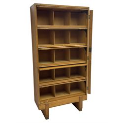 Mid-20th century oak 'Staverton' cabinet, fitted with five hinged sections