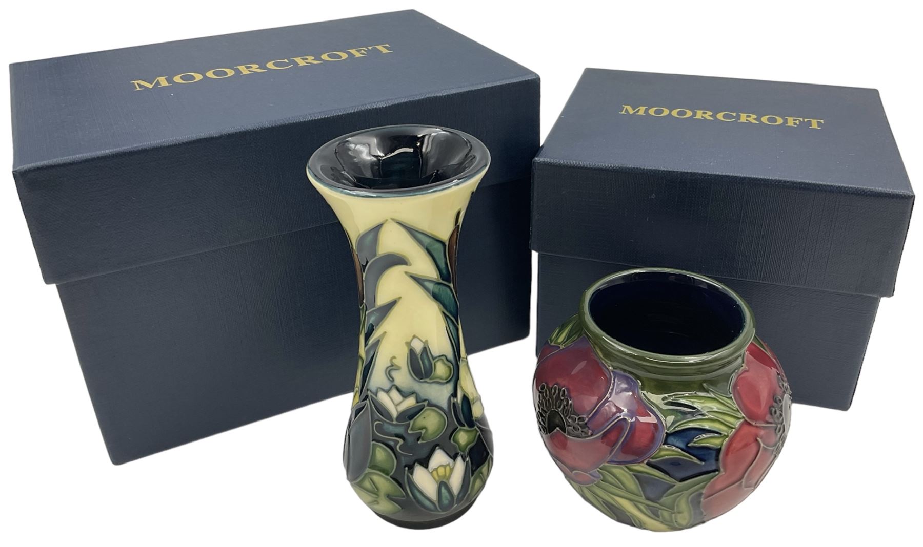 Two small Moorcroft vases, one decorated in the Lamia pattern by Rachel Bison, circa 1995, H13cm and the other in the Anemone Tribute pattern by Emma Bossons, circa 2002, H7.5cm, both with original boxes (2)