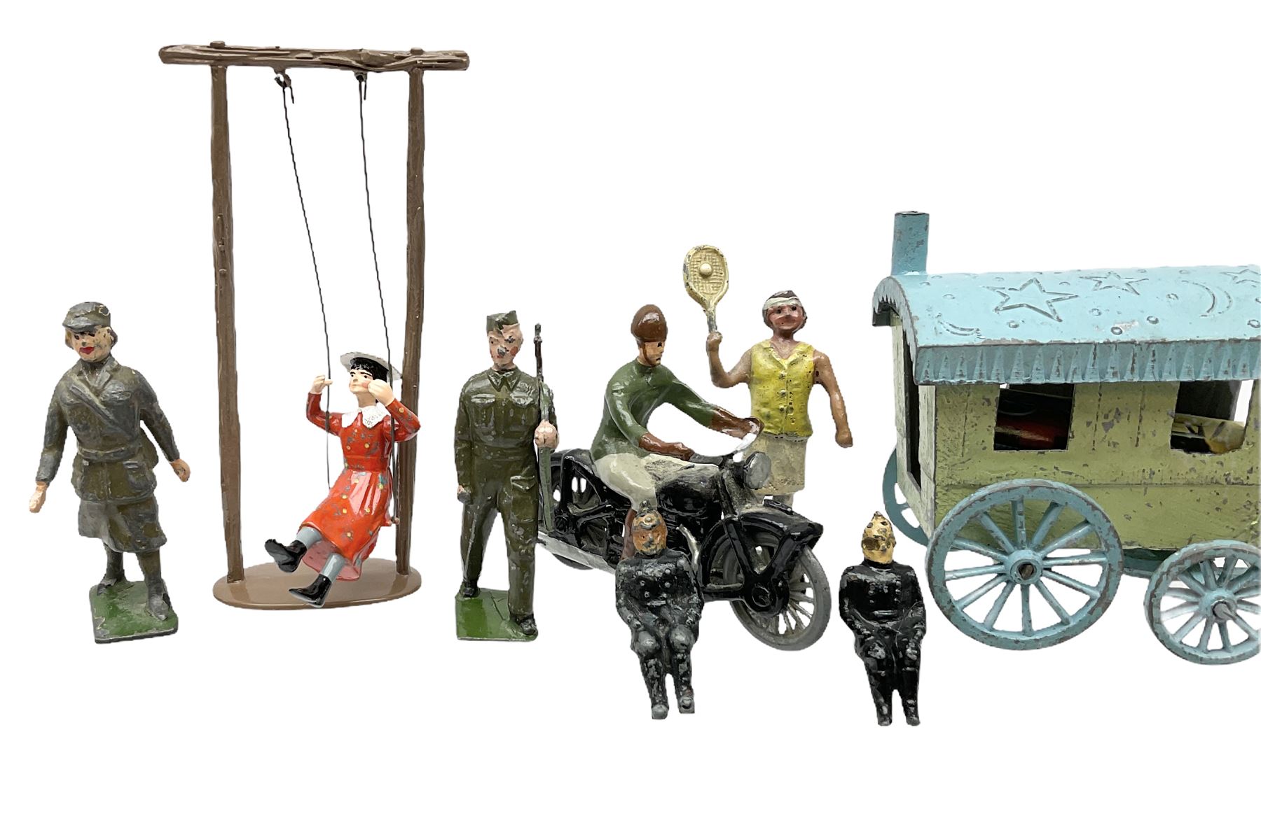 Selco Services gypsy caravan with horse, figure and steps; die-cast tandem combination; motorcycle with rider; die-cast girl-on-swing; and twelve various lead figures by Johilco etc