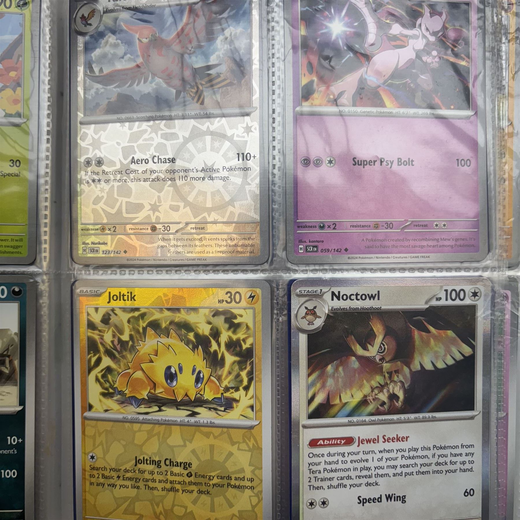 Collection of modern Pokemon TCG trading cards from the Scarlet & Violet and Sword & Shield eras, contained within in two folders, opened packets and loose, together with a graded Sword & Shield Silver Tempest Passiman TG08, GET Graded 9 Mint, two oversized cards, energy cards, vintage booklets and boxes, empty tins, 1998 Electronic Pokédex and other accessories