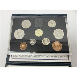 Six The Royal Mint United Kingdom proof coin collections, dated 1983, 1984,1988,1992 including dual dated 1992/1993 EEC fifty pence, 1990 and 1995 , all in blue folders with certificates