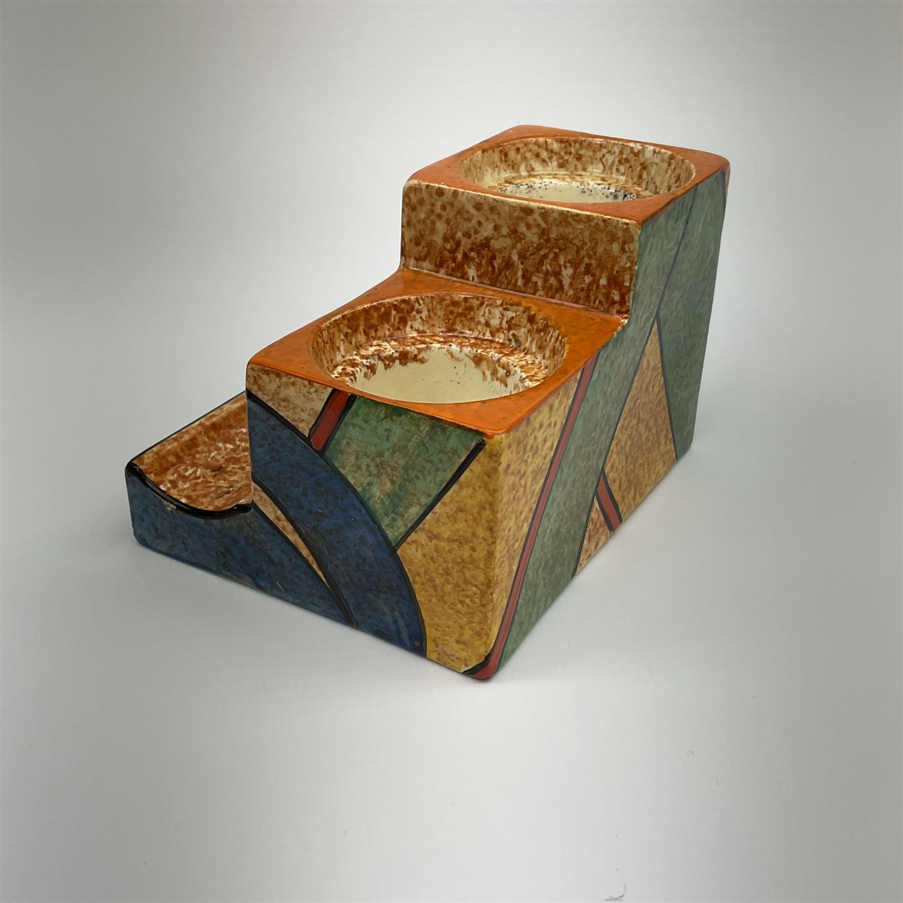 A Clarice Cliff Bizarre Cafe au lait double cube inkwell with pen tray, decorated in the Berries pattern, with printed mark to base, and shape number 462, H7cm W10cm. 