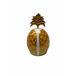 Three Royal Worcester candle snuffers, in the form of a pear, a pineapple and a champagne bottle from the Millennium Collection, the tallest H12cm all with printed mark.  